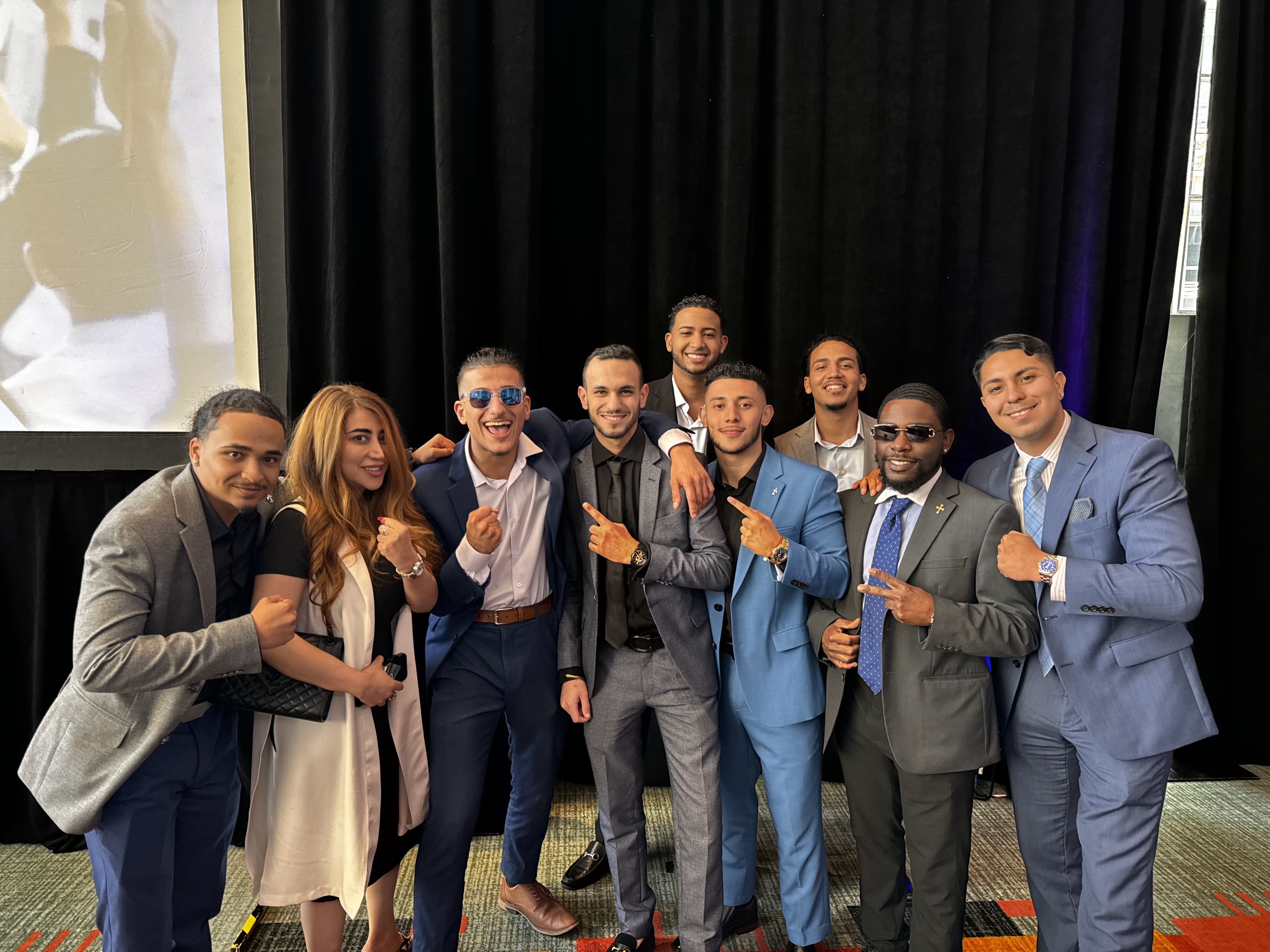 Fine Line Vision team group photo at a formal event