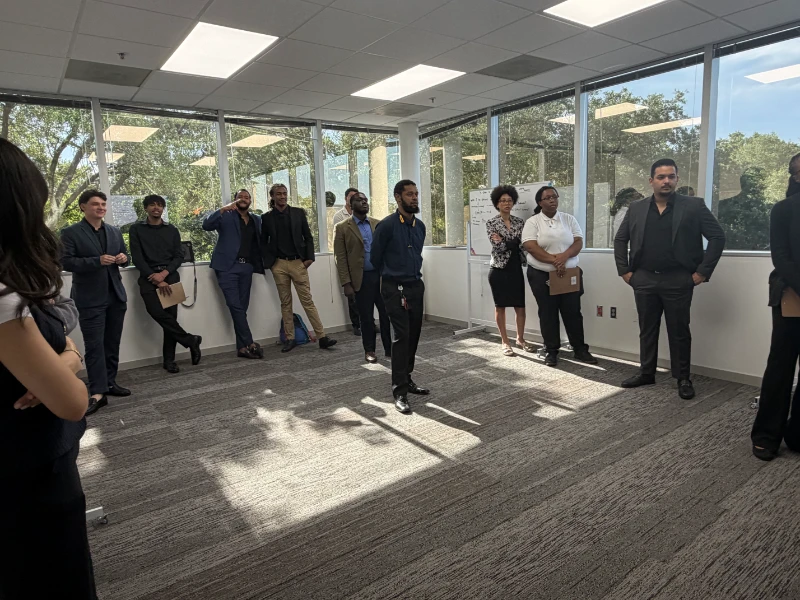 Fineline Vision team celebrating professional achievements and workplace success