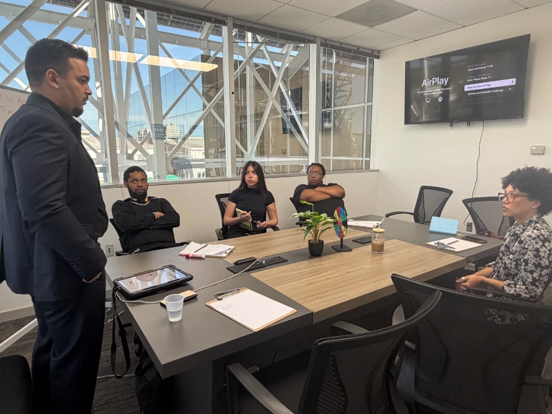 Team members attending a leadership development and business growth workshop