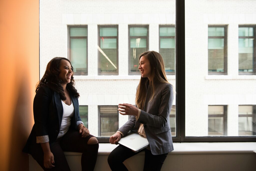 Two women having a conversation on career growth and development