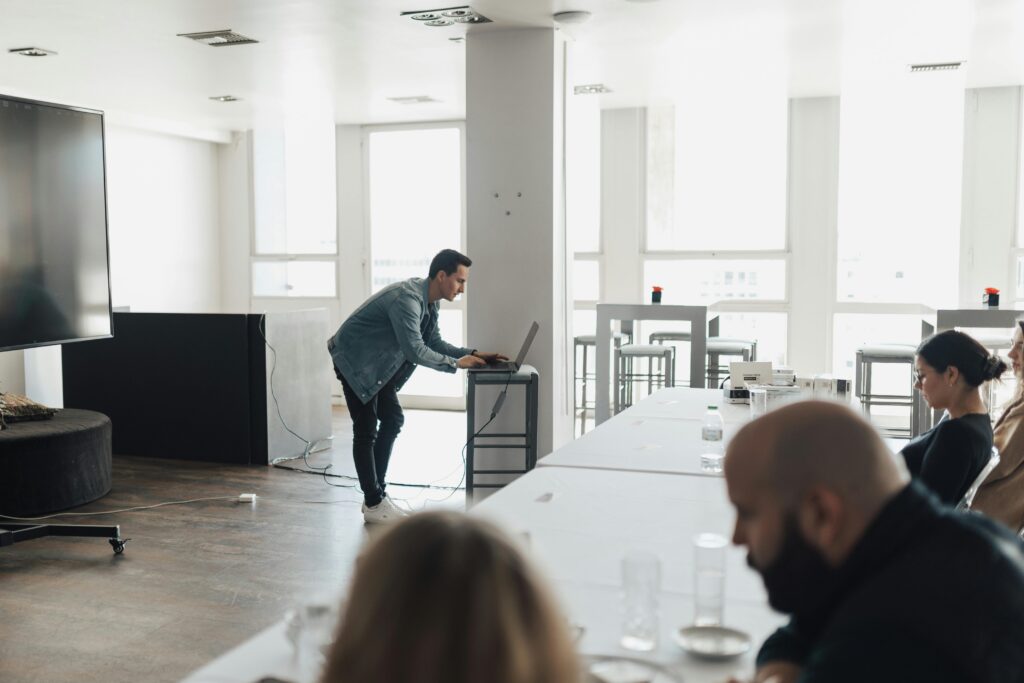 A man preparing a presentation on the benefits of management training